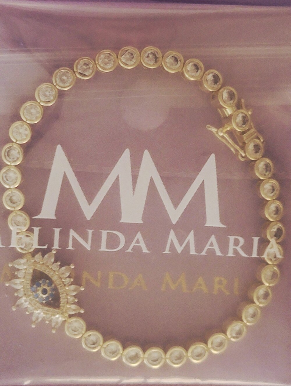Melinda Maria Elegant Evil Eye Bracelet with Blue and Silver Accents 7 1/4